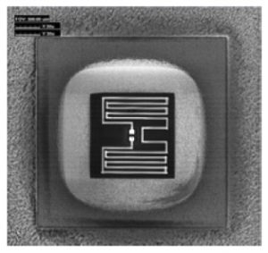 Figure 6 Back-side FIB circuit edit is used to introduce a resistor across two nodes.