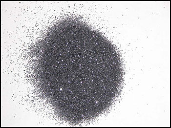 Using a special sample preparation technique and a new SIMS analytical protocol, individual SiC particles with a size ranging from 100 um to 500 um in a SiC powder sample can be analyzed. This innovative approach eliminates contributions from surface contamination to bulk concentration.