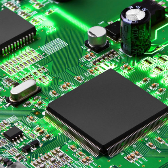 Electronic circuit board with processor, close up.